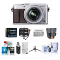 16.8MP Silver Digital Camera with Camera Case, 64GB SDHC Card, Spare Battery, Aluminum Table T91616
